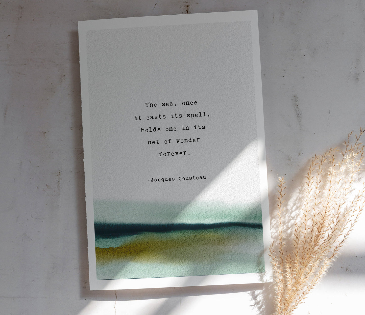 Jacques Cousteau quote print "The sea, once it casts its spell, holds one in its net of wonder forever". Watercolor art with quote.