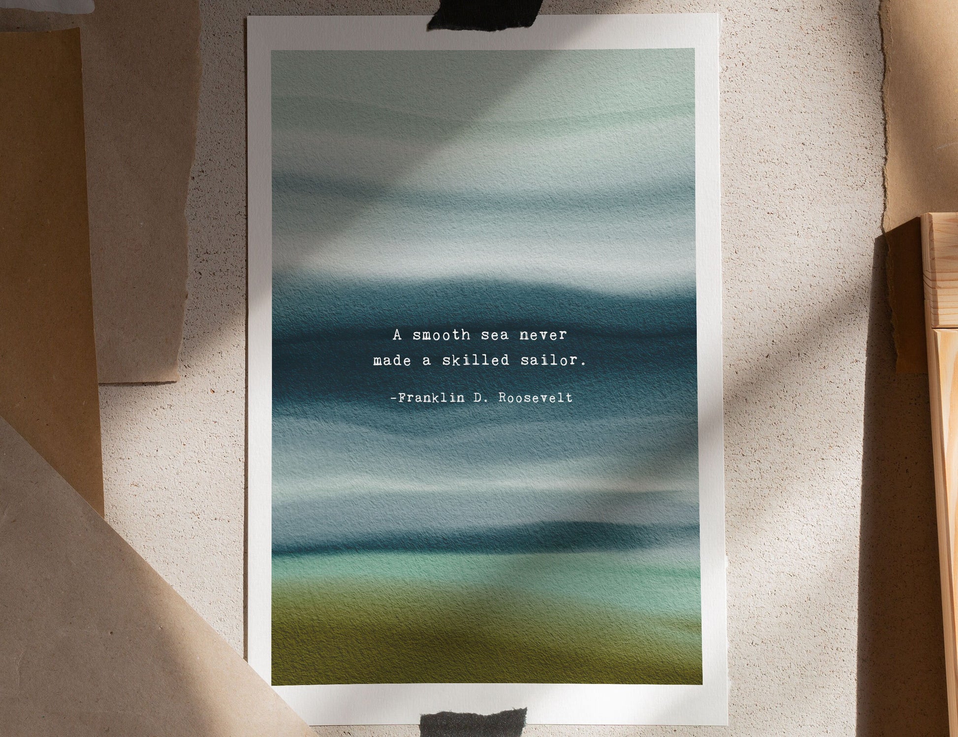 Watercolor wall art featuring a quote by Roosevelt which says "A smooth sea never made a skilled sailer."e